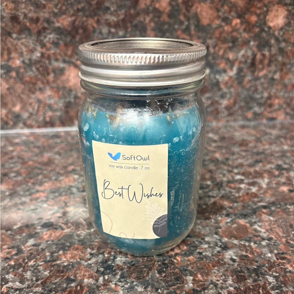 Handmade upcycled candle blue with bubble gum scent with lavender flower garnish